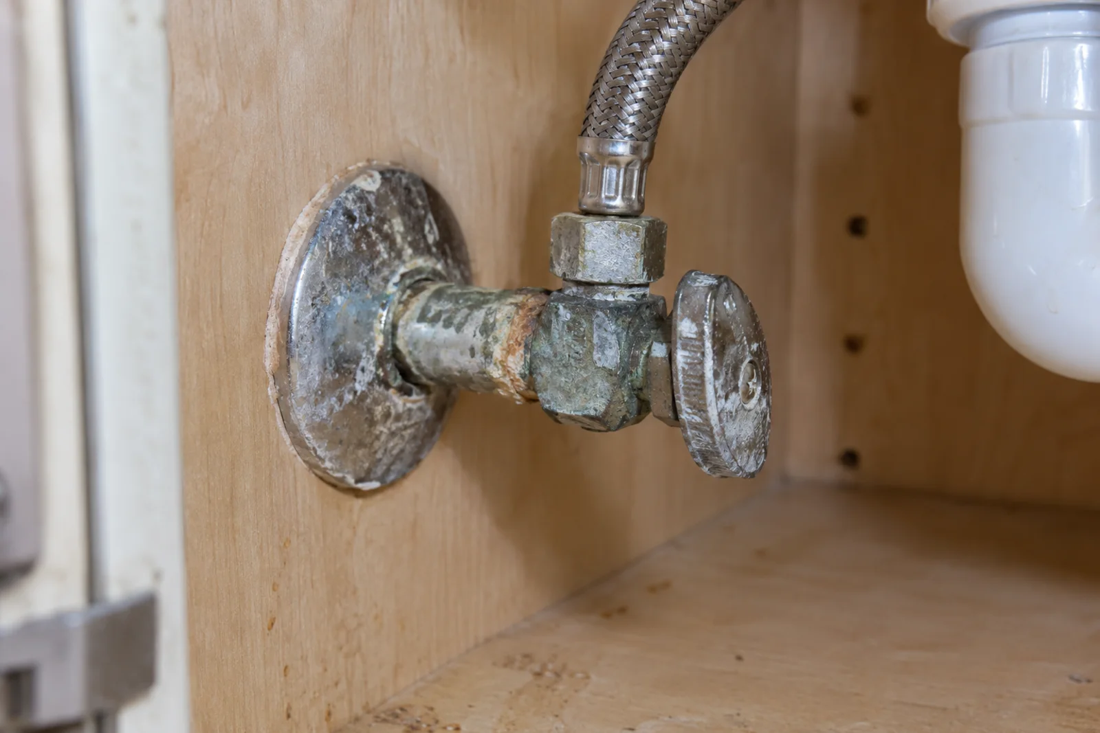 Corrosion and mineral buildup around an under-sink shutoff valve