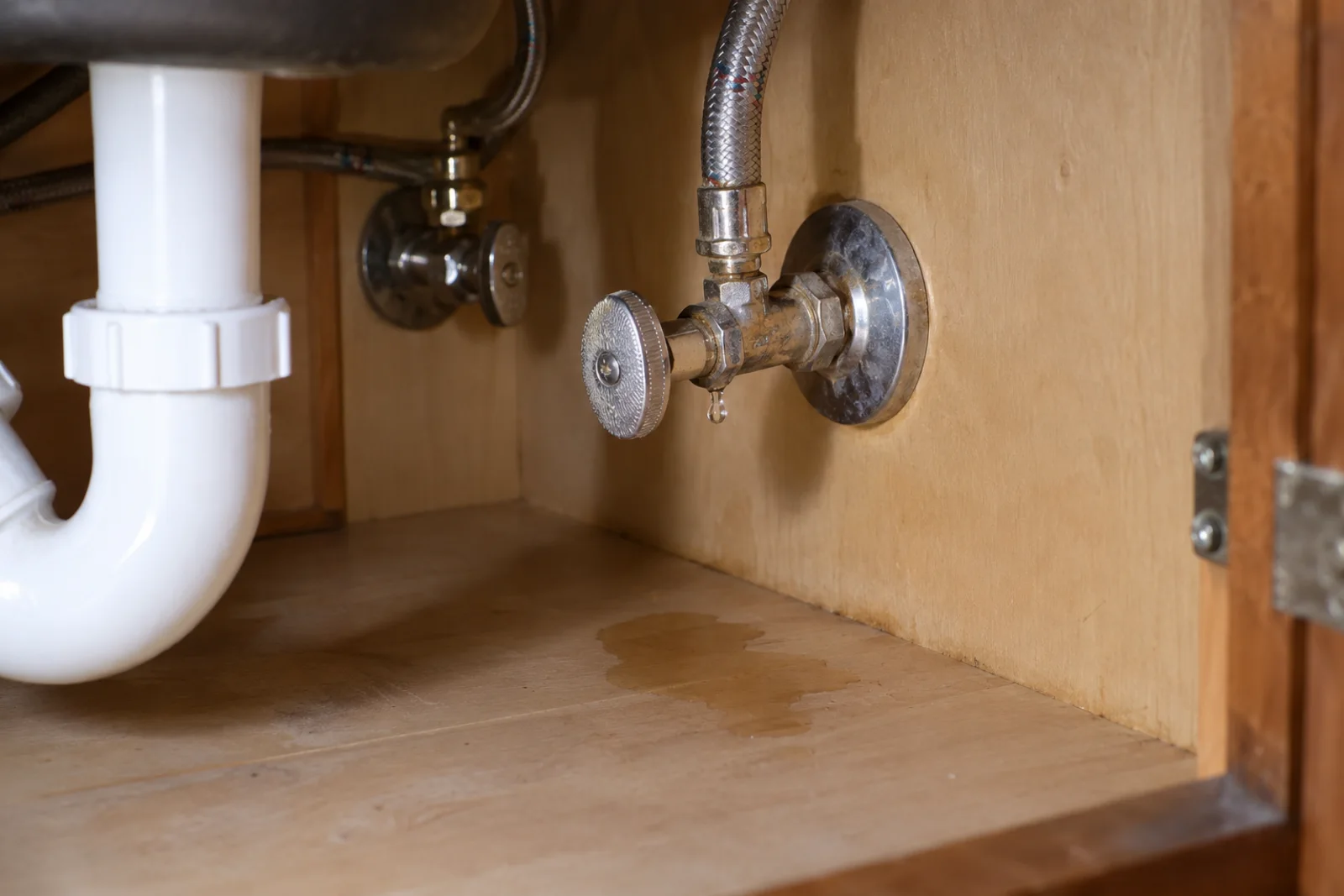 Water beading at an under-sink faucet supply-line connection