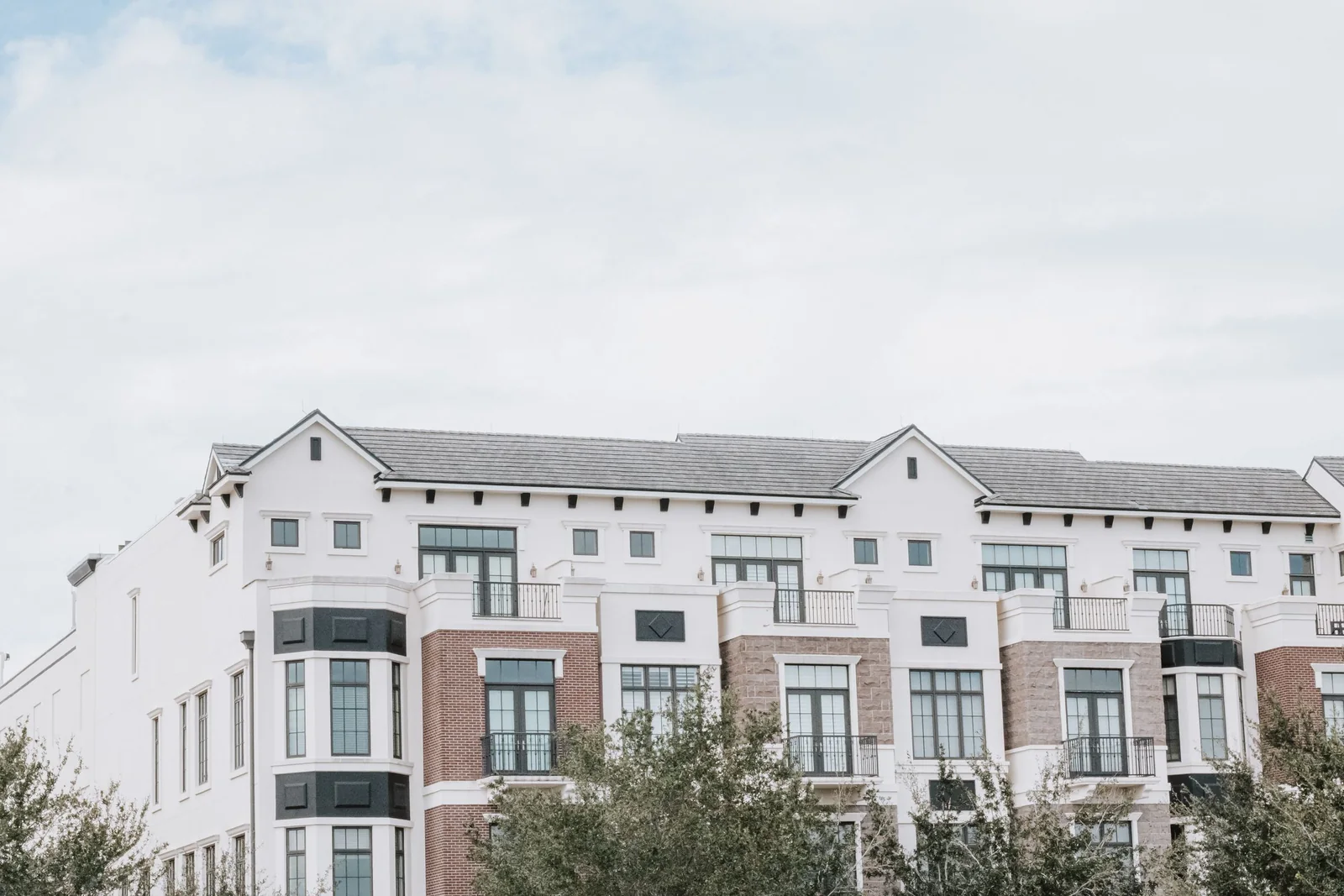 Multi-unit property managed by an on-site or portfolio contact