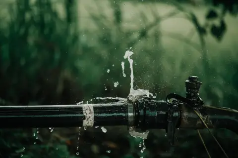Water escaping from a leaking plumbing connection