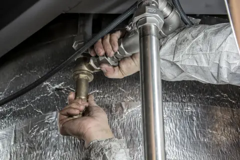 Plumber fitting residential water lines